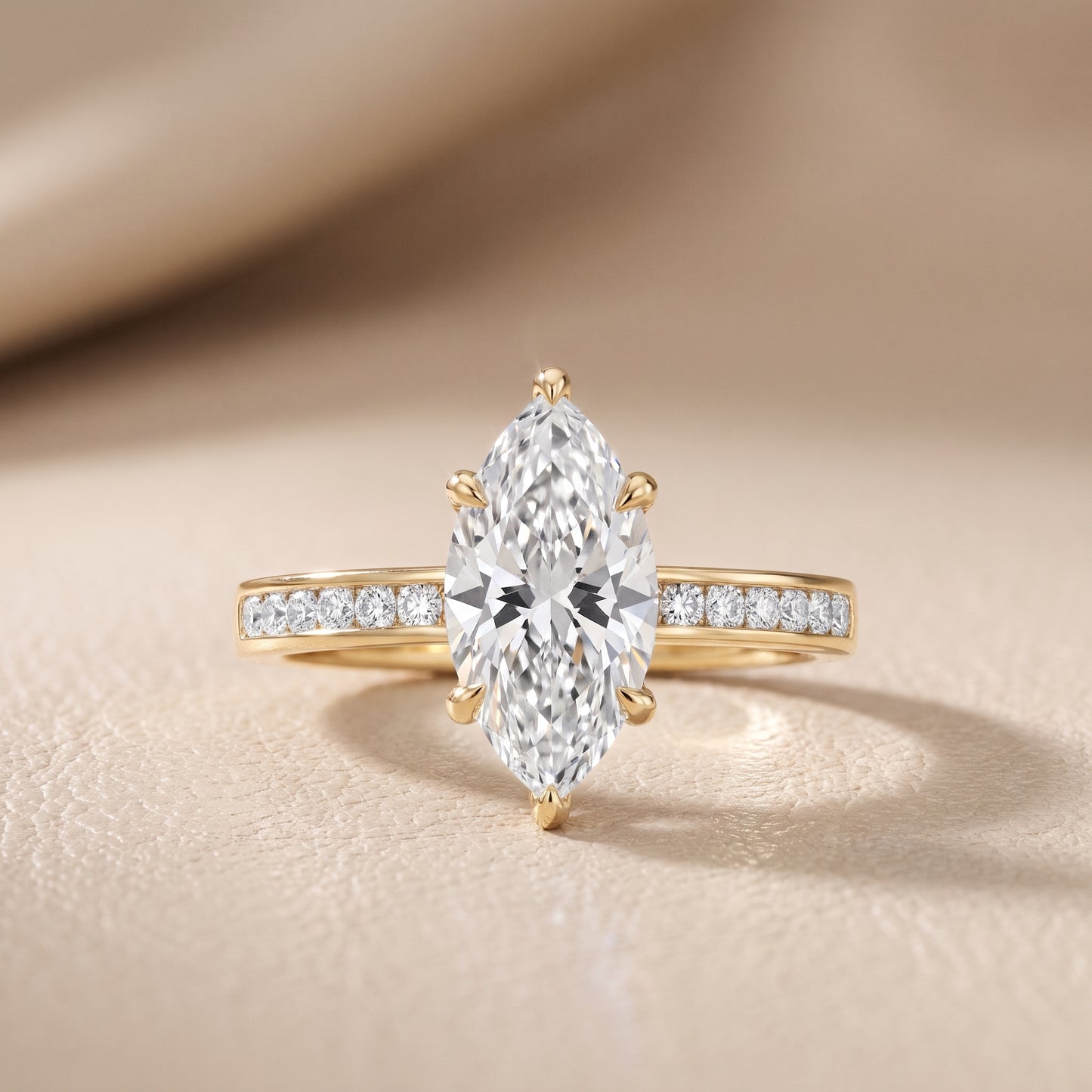 Maren Sidestone Channel Set Marquise Diamond Engagement Ring in Yellow Gold - front.jpg