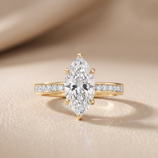 Maren Sidestone Channel Set Marquise Diamond Engagement Ring in Yellow Gold - front.jpg