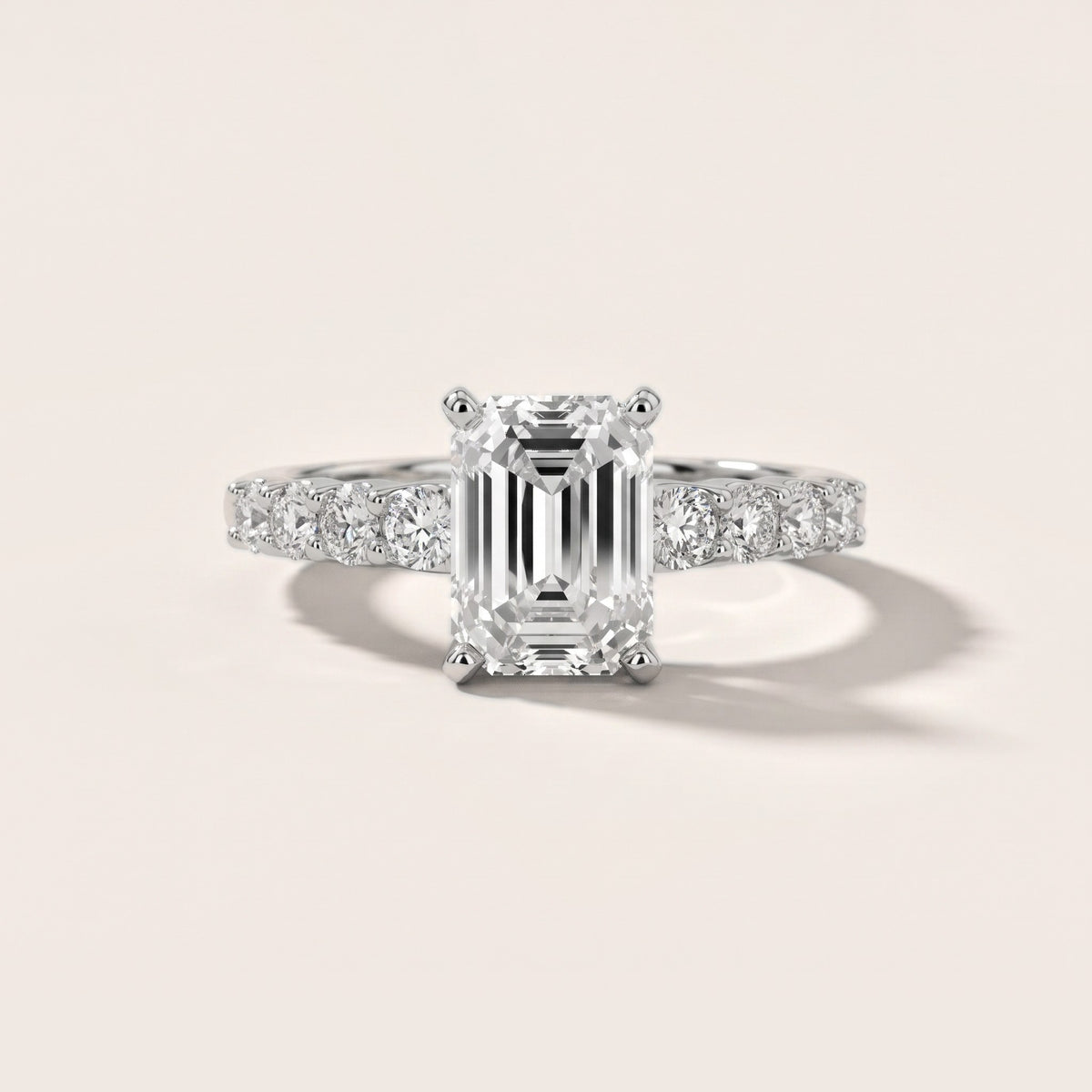 Augusta Graduated Pavé Emerald Diamond Engagement Ring in Silver - front.jpg