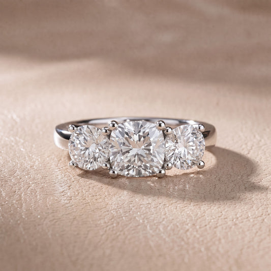Callie Three-Stone Trellis Cushion Diamond Engagement Ring in White Gold - front.jpg