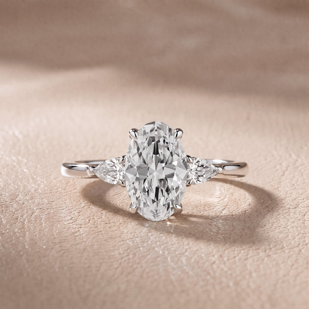 Leila Three-Stone Oval Diamond Engagement Ring in Silver - front.jpg