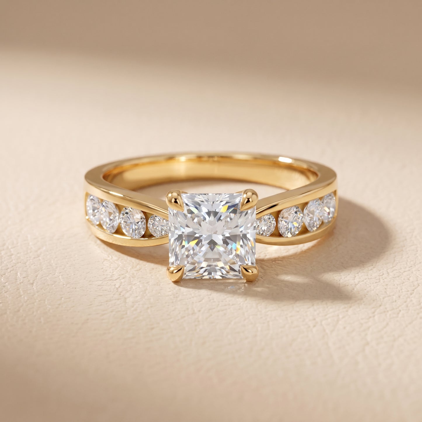 Noor Channel Set Sidestone Radiant Diamond Engagement Ring in Yellow Gold - front.jpg