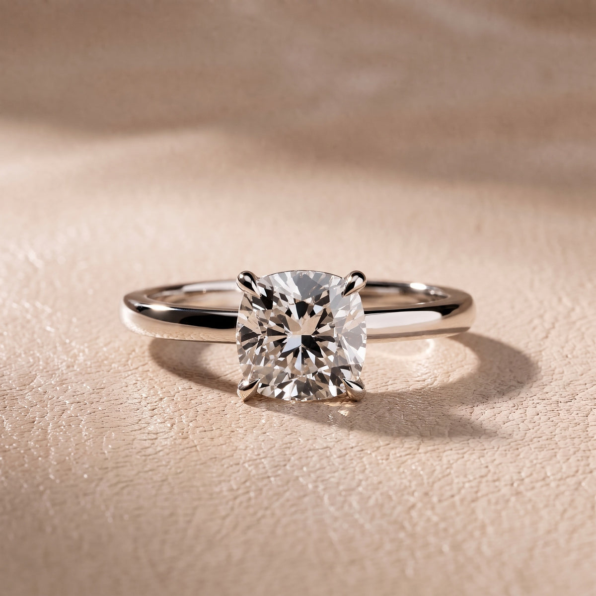 Nadia Petite Solitaire Cushion Diamond Engagement Ring in Platinum - front.jpg