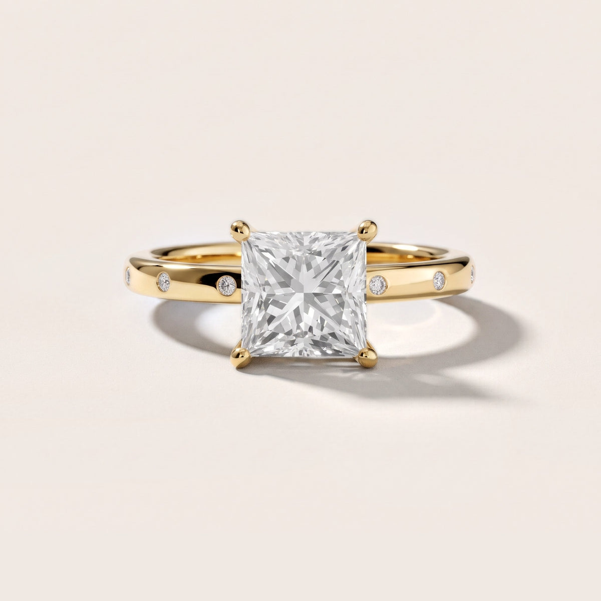Dulcie Flush-Set Princess Diamond Engagement Ring in Yellow Gold - front.jpg