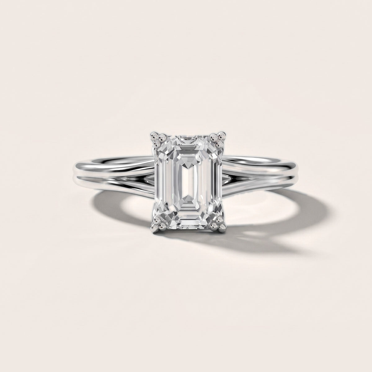 Neve Solitaire Split Shank Emerald Diamond Engagement Ring in Platinum - front.jpg