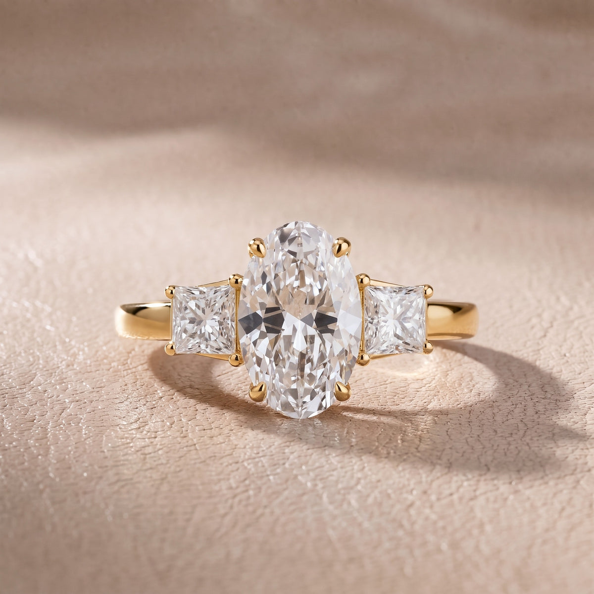 Aria Three-Stone Basket Oval Diamond Engagement Ring in Yellow Gold - front.jpg