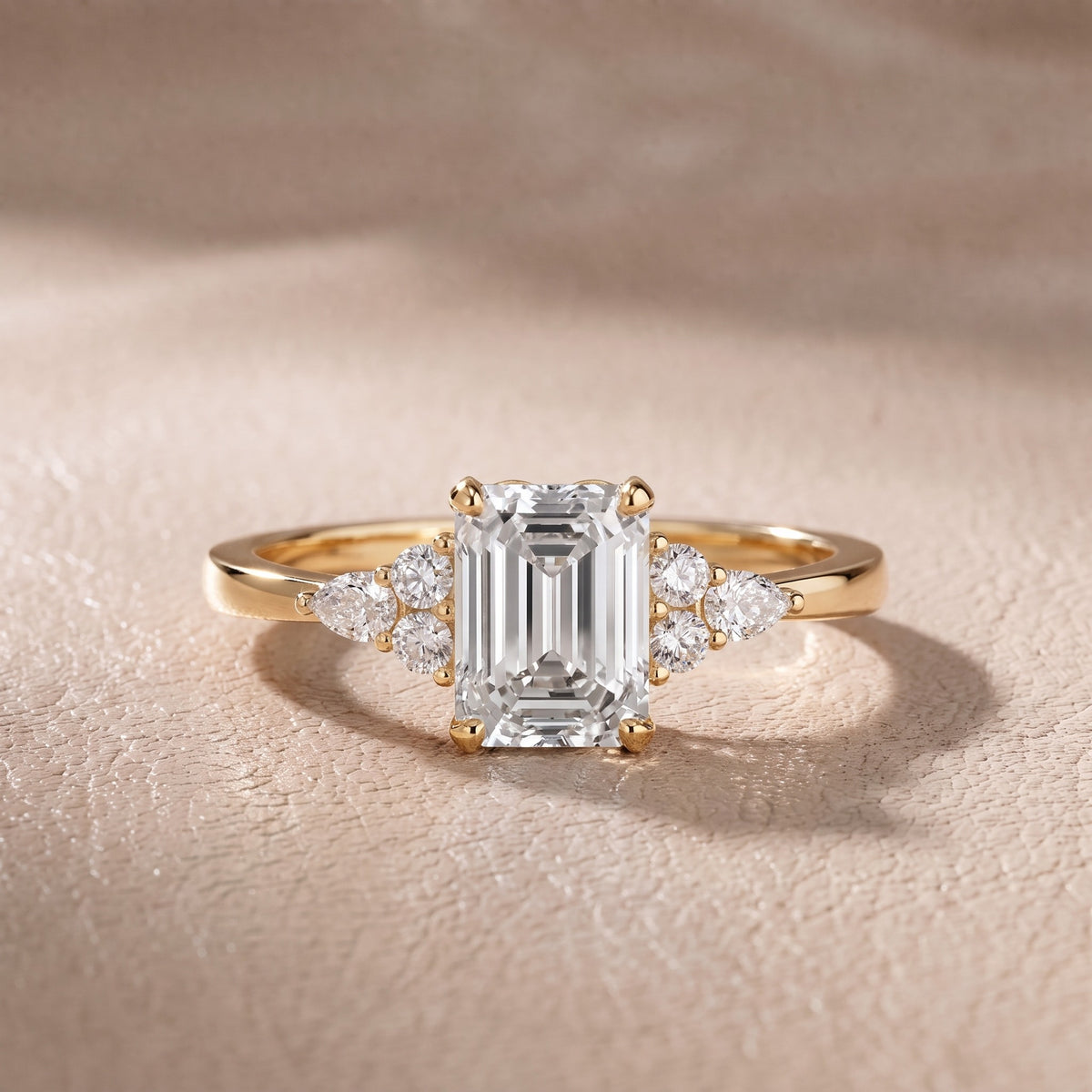Amelia Three Stone Emerald Diamond Engagement Ring in Yellow Gold - front.jpg