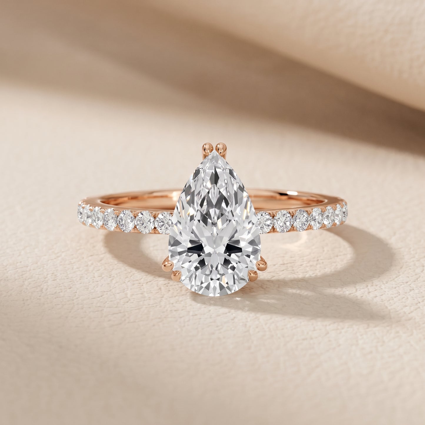 Novara Solitaire Pavé Pear Diamond Ring in Rose Gold - front.jpg
