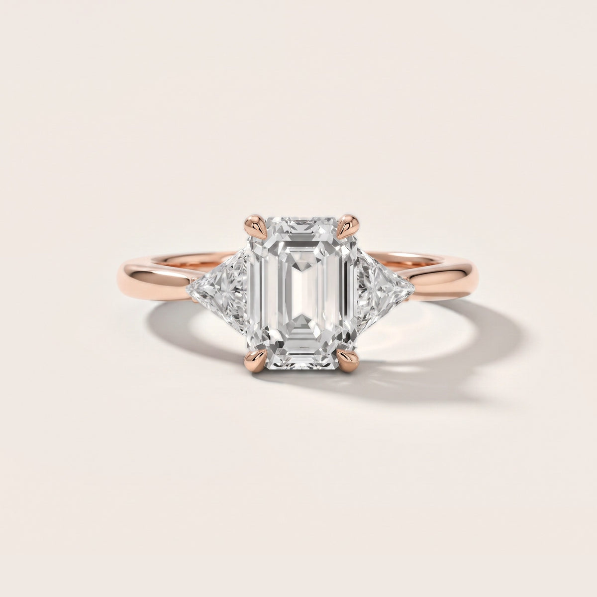 Clemency Three-Stone Cathedral Emerald Diamond Engagement Ring in Rose Gold - front.jpg