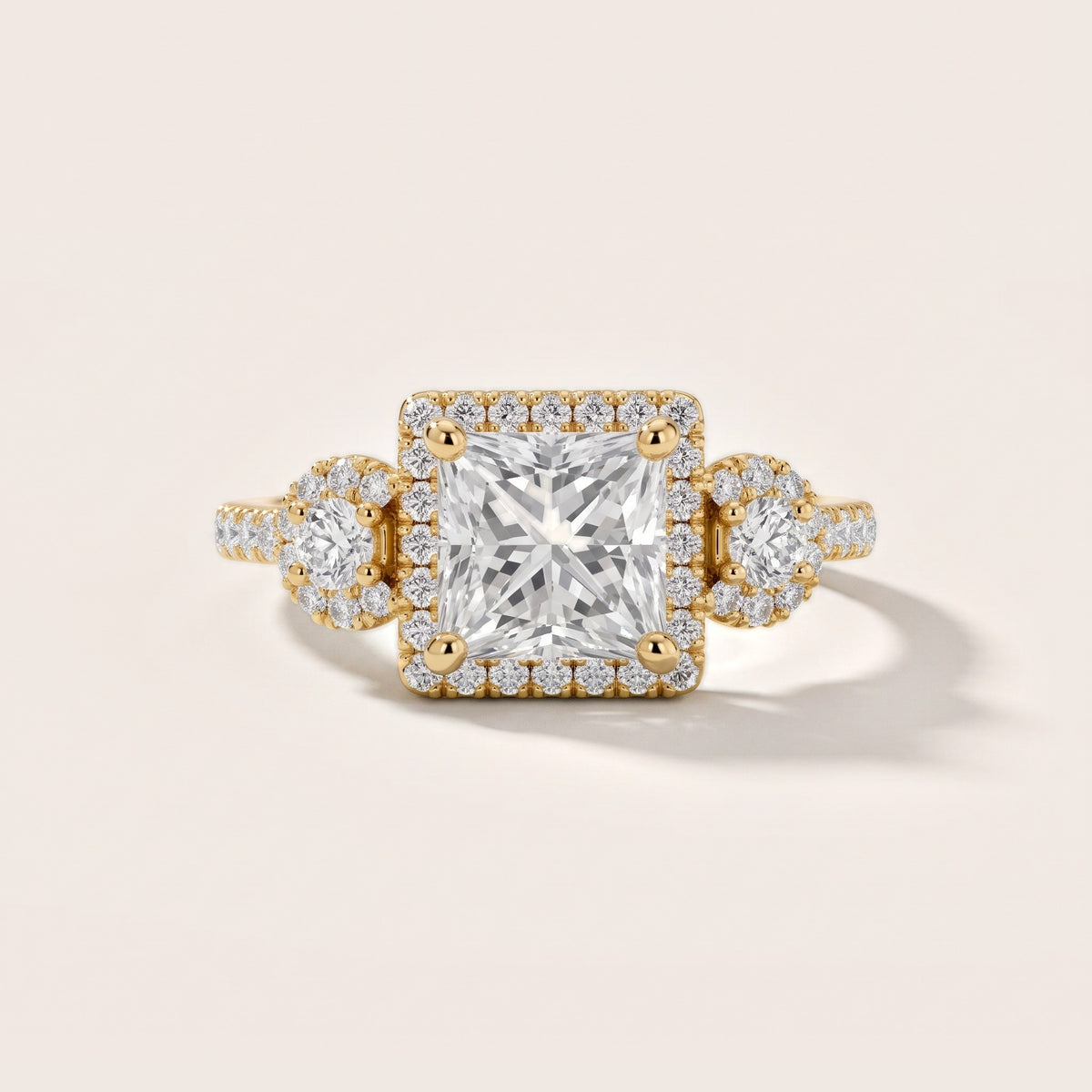 Denver Three-Stone Halo Princess Diamond Engagement Ring in Yellow Gold - front.jpg