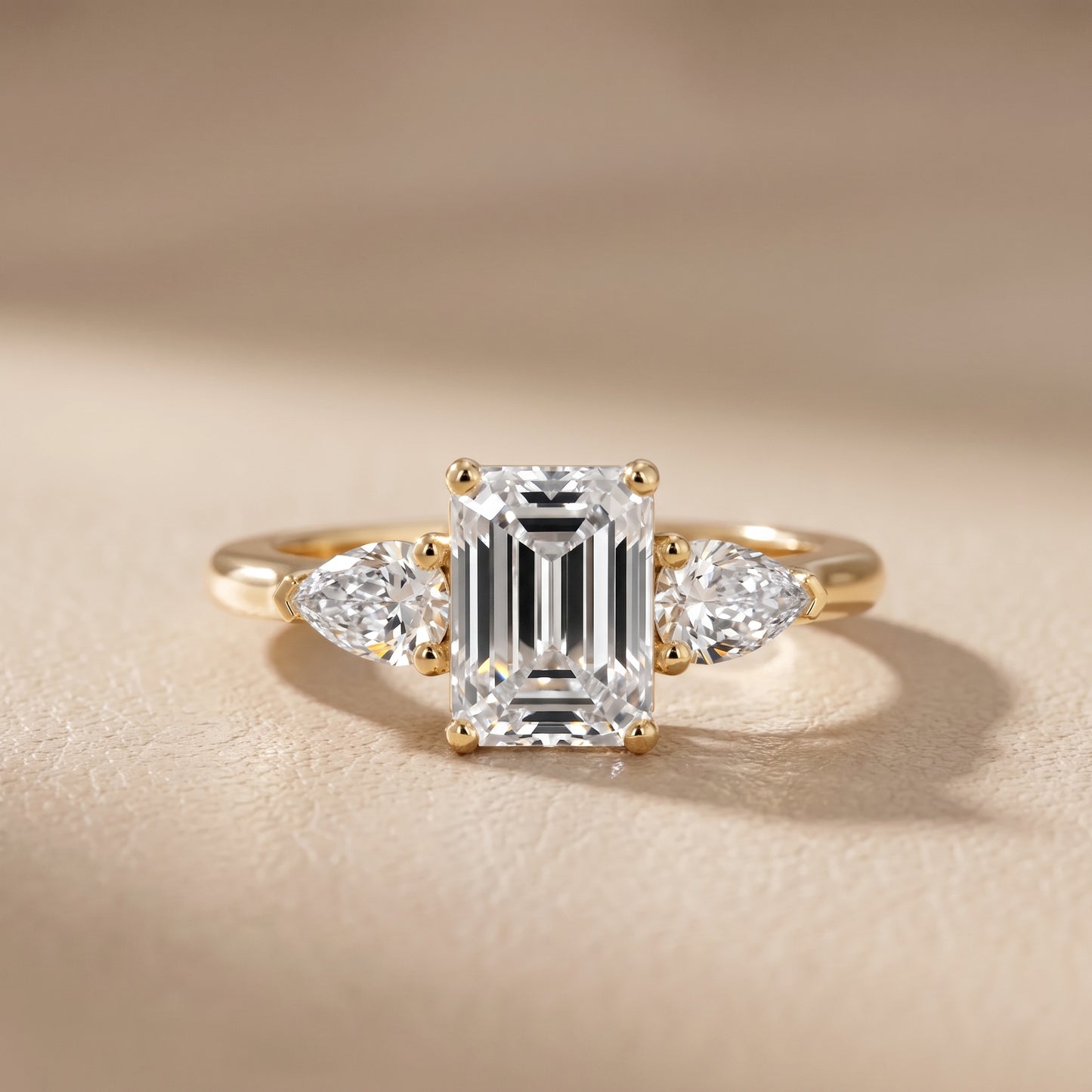 Mirabel Three-Stone Emerald Diamond Engagement Ring in Yellow Gold - front.jpg