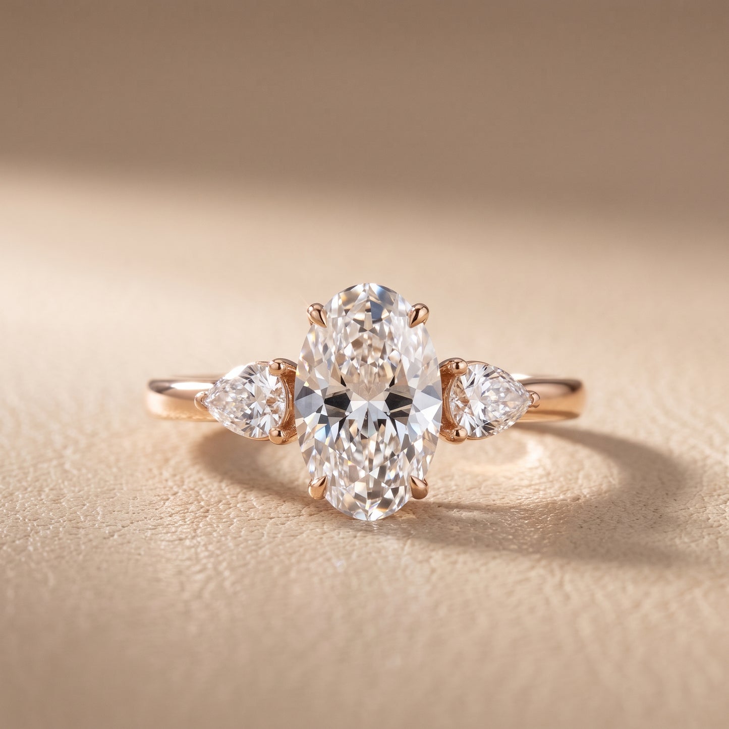 Phoebe Three-Stone Oval Diamond Ring in Rose Gold - front.jpg