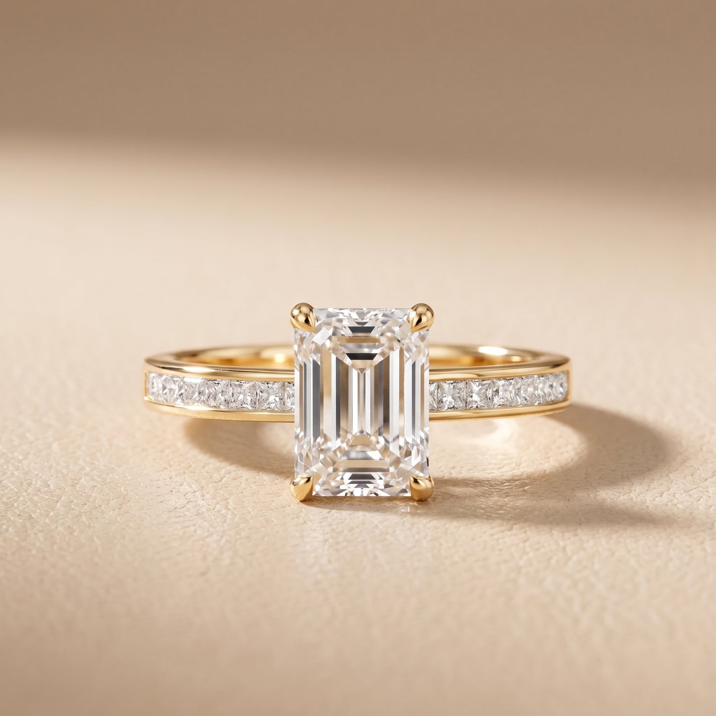 Maren Sidestone Channel Set Emerald Diamond Engagement Ring in Yellow Gold - front.jpg