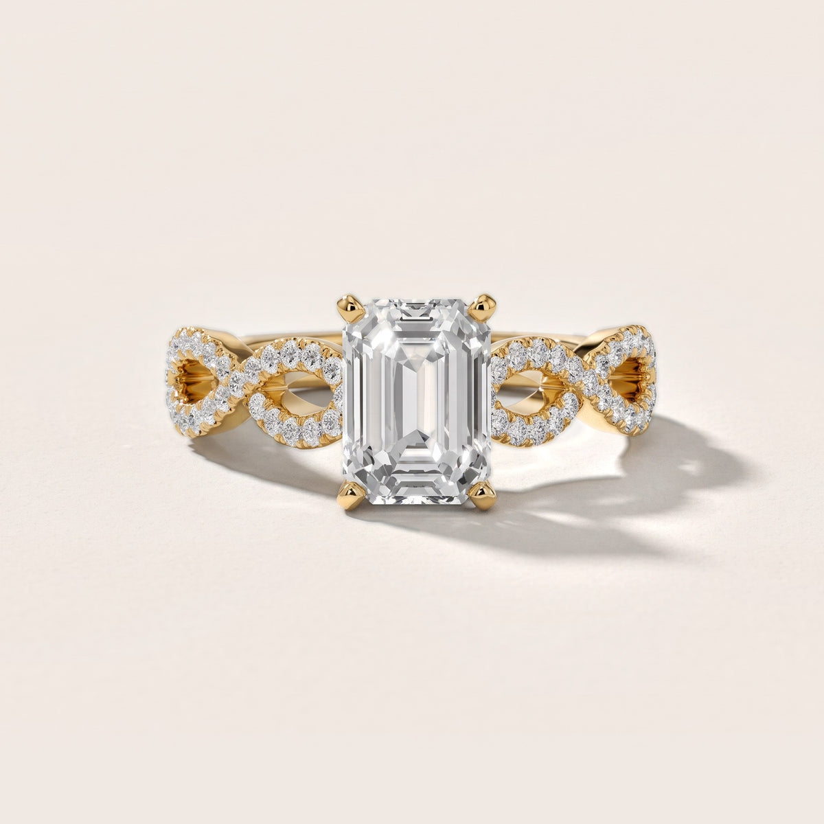 Althea Twist Micropavé Emerald Diamond Engagement Ring in Yellow Gold - front.jpg