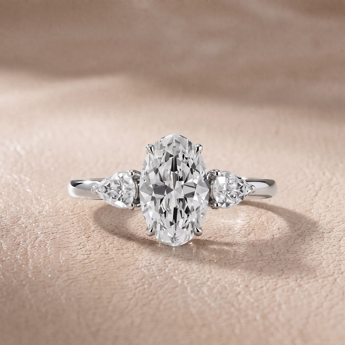 Stella Three-Stone Oval Diamond Engagement Ring in Silver - front.jpg
