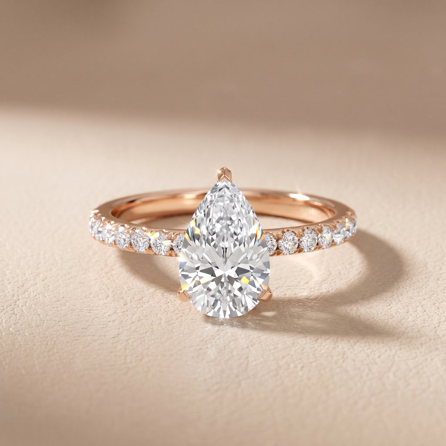 Juna French Pavé Solitaire Pear Diamond Engagement Ring in Rose Gold - front.jpg