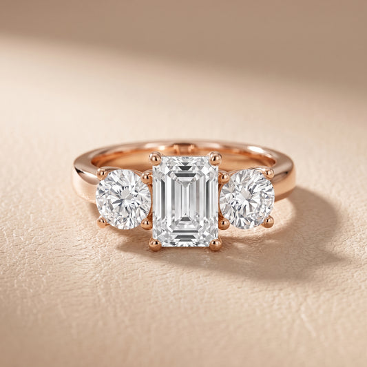 Callie Three-Stone Trellis Emerald Diamond Ring in Rose Gold - front.jpg
