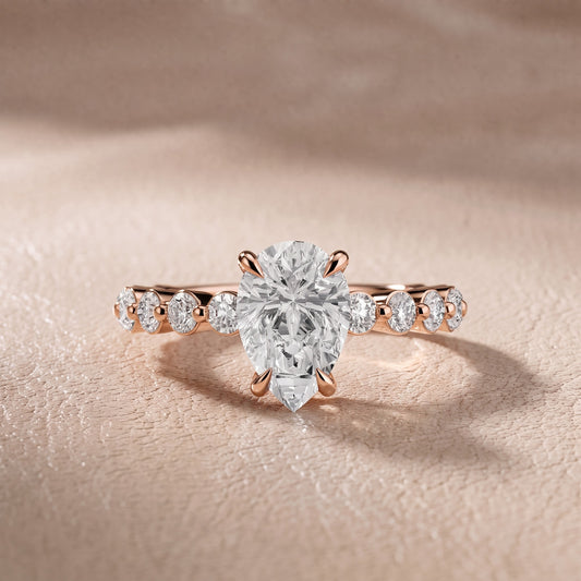Piper Sidestone Pear Diamond Engagement Ring in Rose Gold - front.jpg