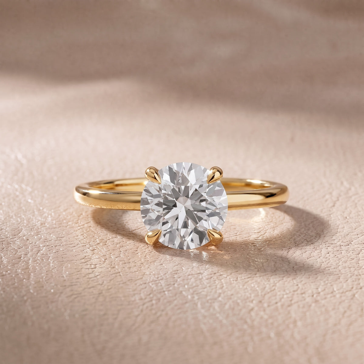 Nella Petite Solitaire Round Diamond Engagement Ring in Yellow Gold - front.jpg