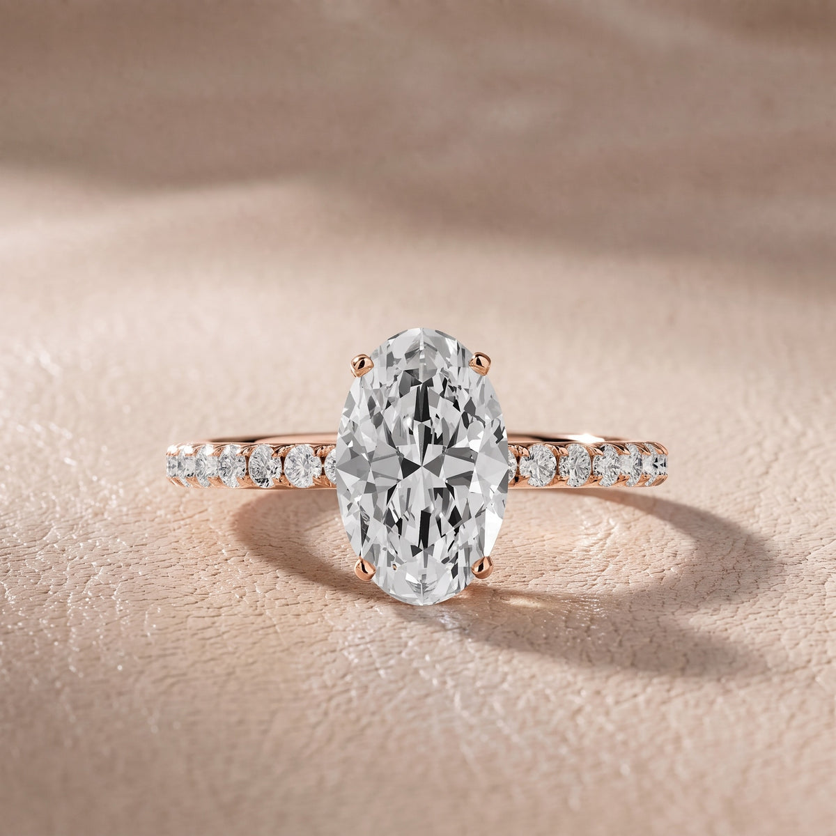 Juna French Pavé Solitaire Oval Diamond Engagement Ring in Rose Gold - front.jpg