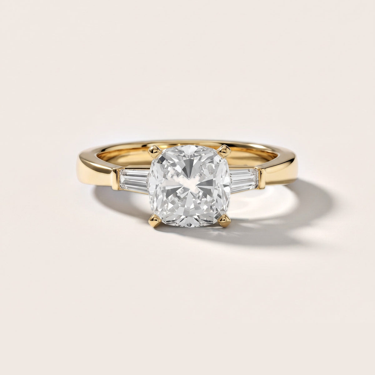 Jacinta Baguette Three-Stone Cushion Diamond Engagement Ring in Yellow Gold - front.jpg