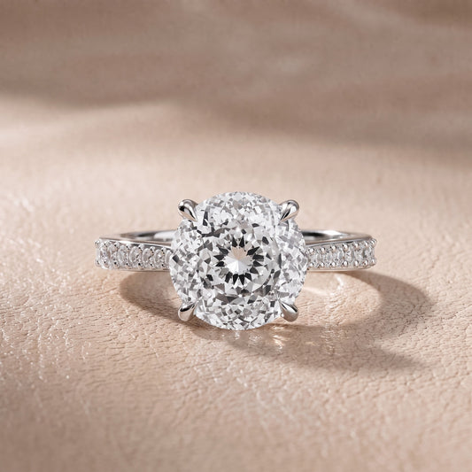 Skylar Twist Pavé Portuguese Cut Round Diamond Engagement Ring in Platinum - front.jpg
