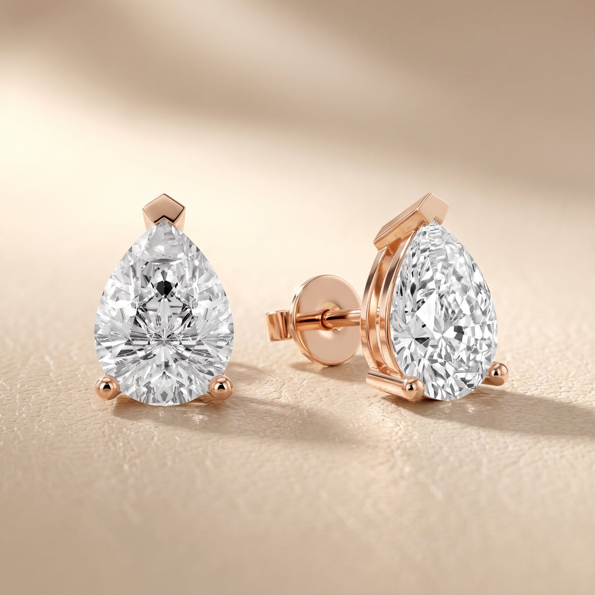 Four Prong Pear Diamond Stud Earrings in Rose Gold - lifestyle
