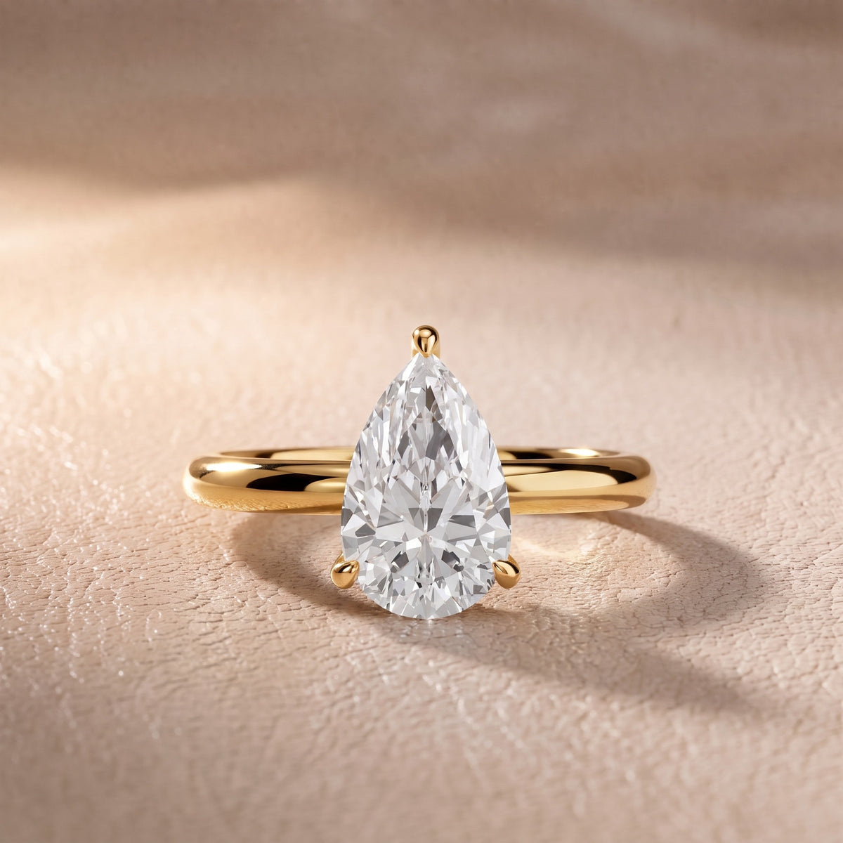 Amaya Hidden Halo Pear Diamond Engagement Ring in Yellow Gold - front.jpg