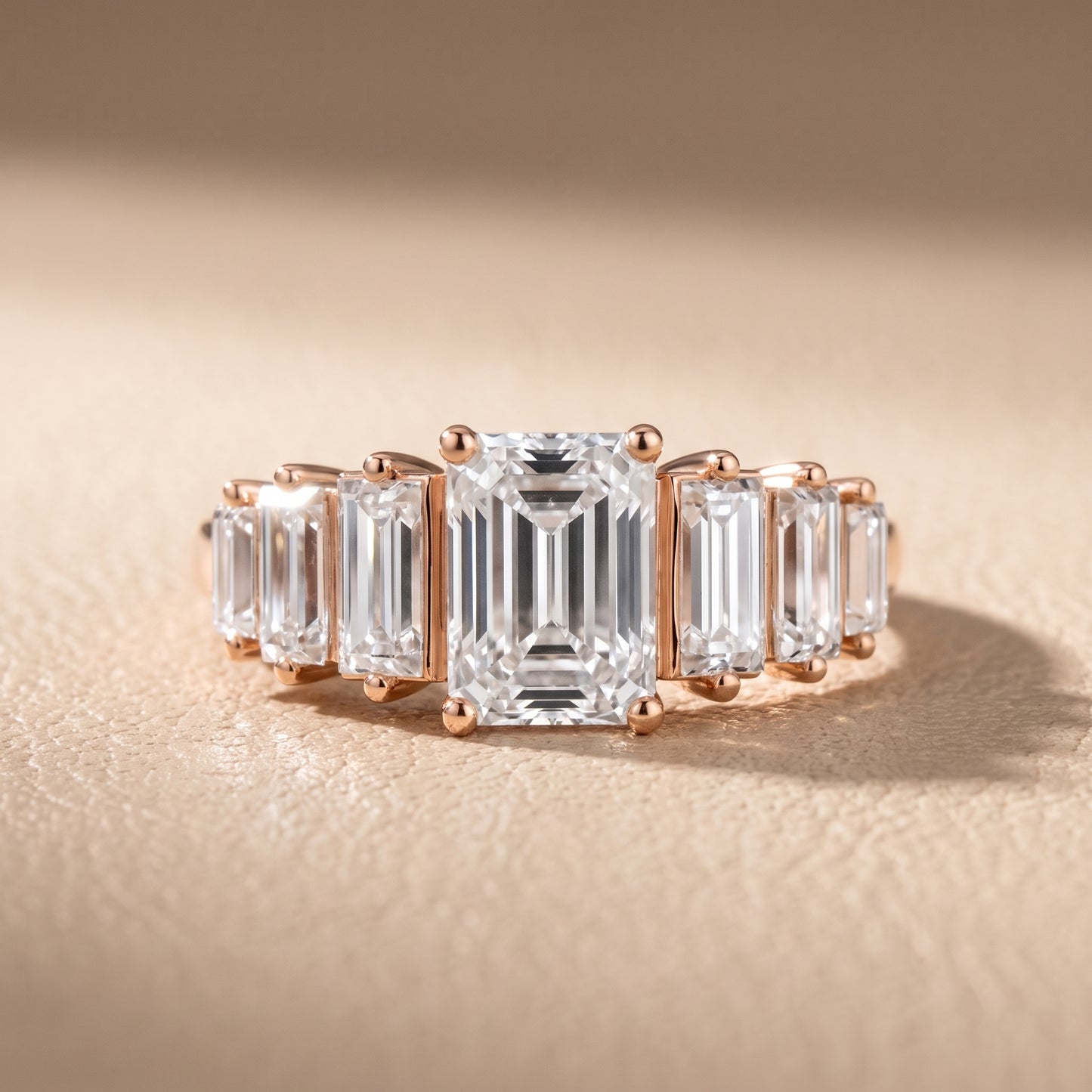 Mara Sidestone Baguette Accent Emerald Diamond Engagement Ring in Rose Gold - front.jpg