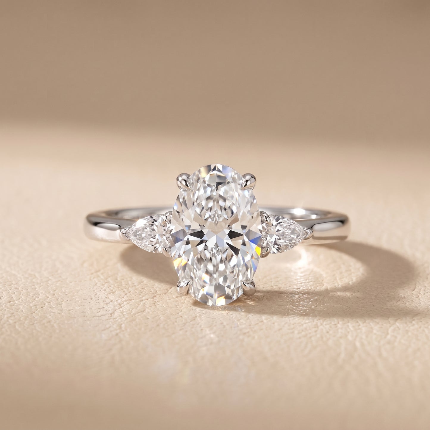 Leila Three-Stone Oval Diamond Engagement Ring in White Gold - front.jpg