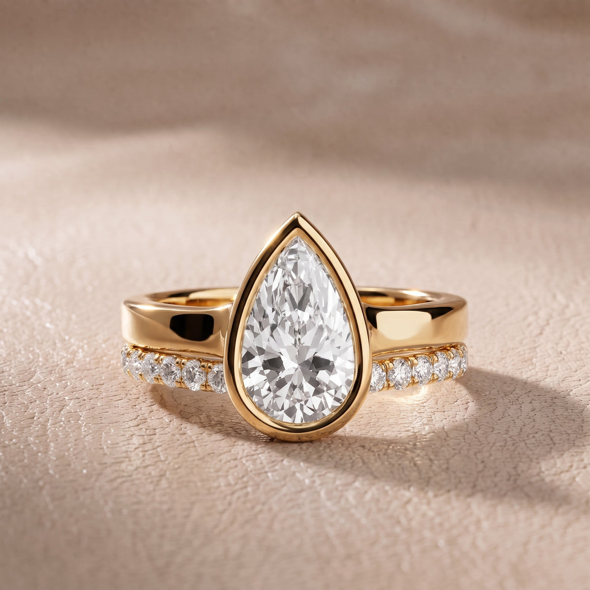 Ayla Bezel Bypass Pear Diamond Engagement Ring in Yellow Gold - front.jpg