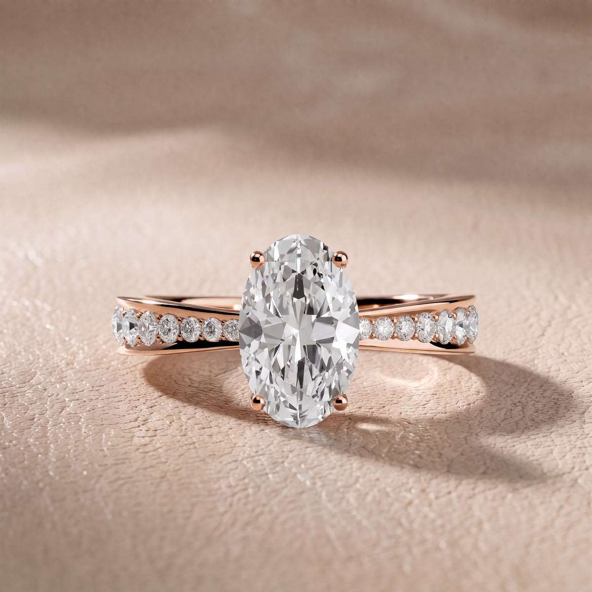 Rhea Sidestone Pavé Oval Diamond Engagement Ring in Rose Gold - front.jpg