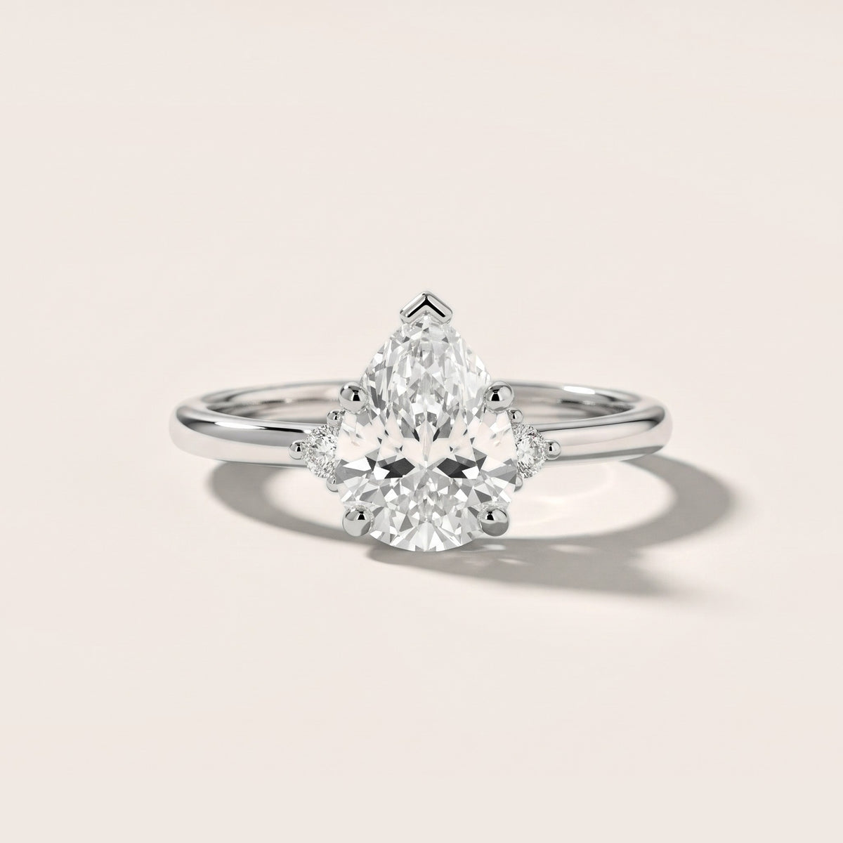 Wynne Cluster Pear Diamond Engagement Ring in Platinum - front.jpg