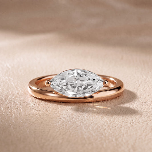 Maisie Four Prong Solitaire Marquise Diamond Engagement Ring in Rose Gold - front.jpg