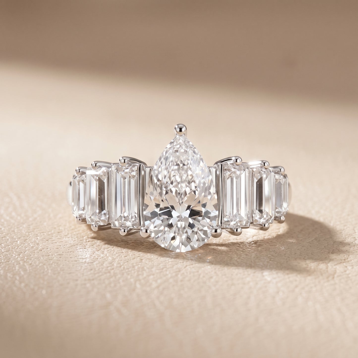 Mara Sidestone Baguette Accent Pear Diamond Engagement Ring in White Gold - front.jpg