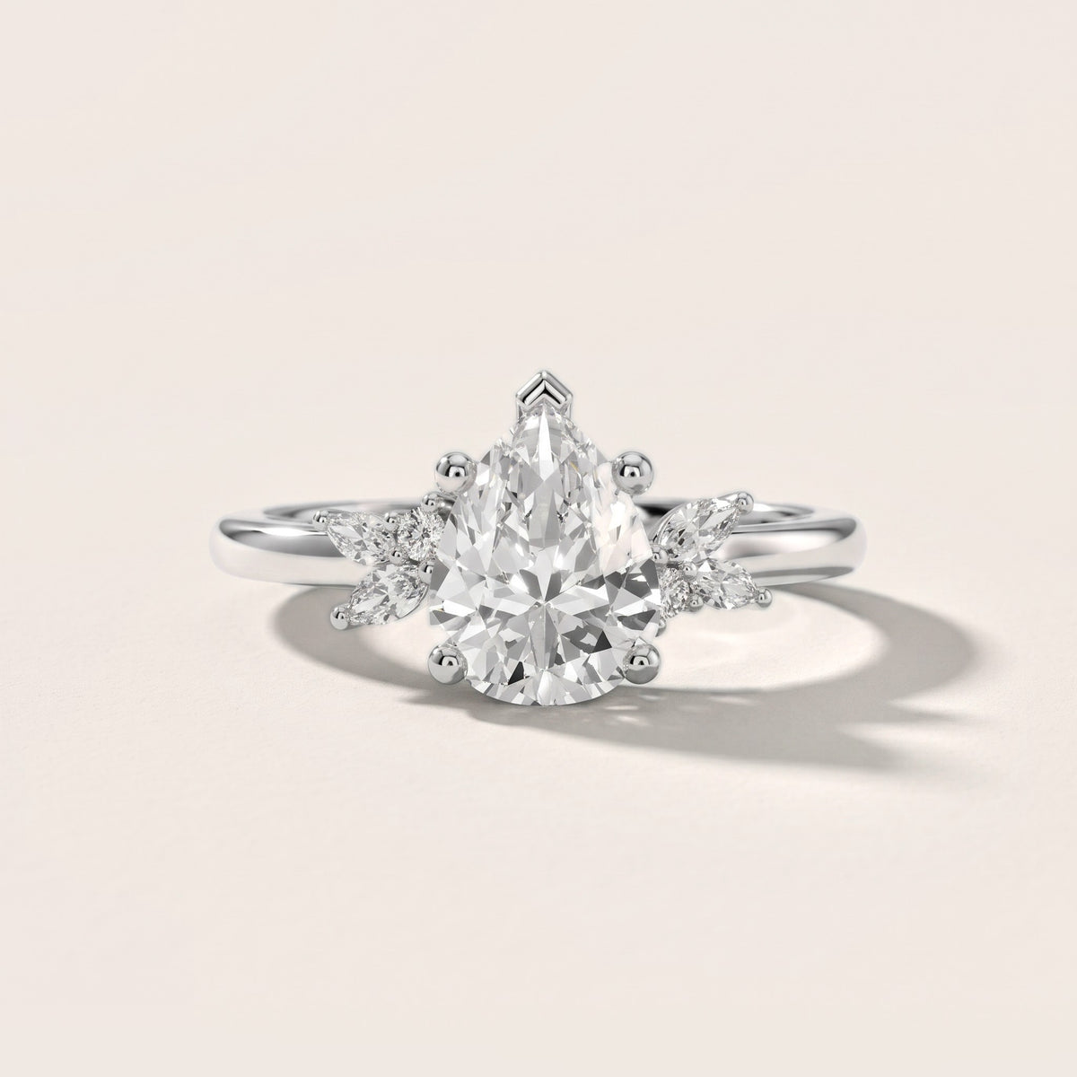 Avon Leaf Cluster Pear Diamond Engagement Ring in Silver - front.jpg