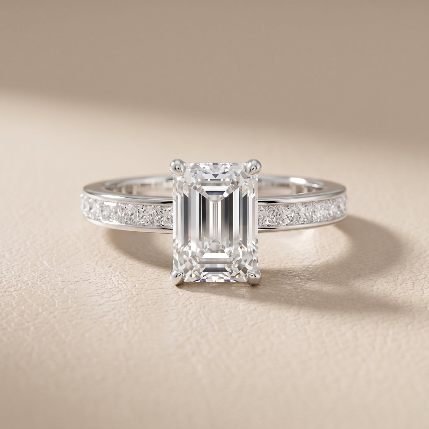 Brielle Channel Set Solitaire Emerald Diamond Ring in Platinum - front.jpg