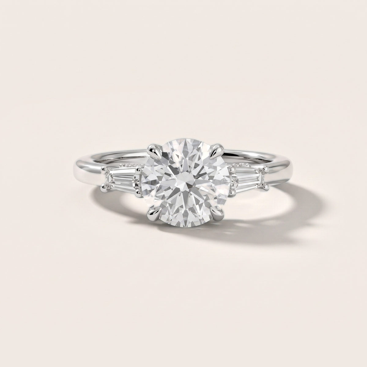 Laredo Baguette Three-Stone Round Diamond Engagement Ring in Platinum - front.jpg