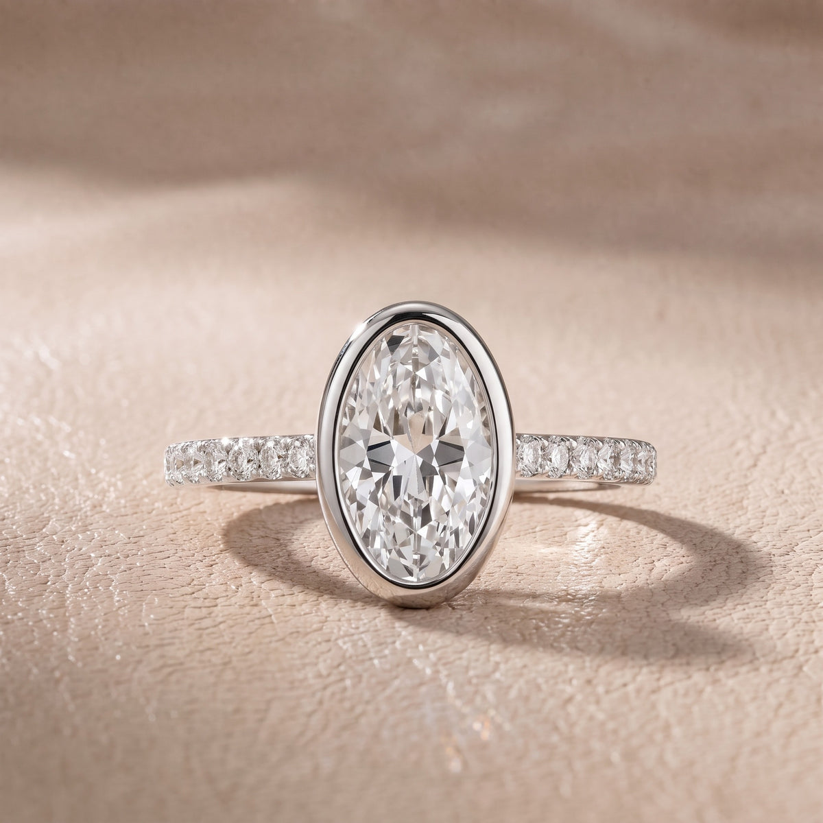 Cora Bezel Pavé Oval Diamond Engagement Ring in Platinum - front.jpg