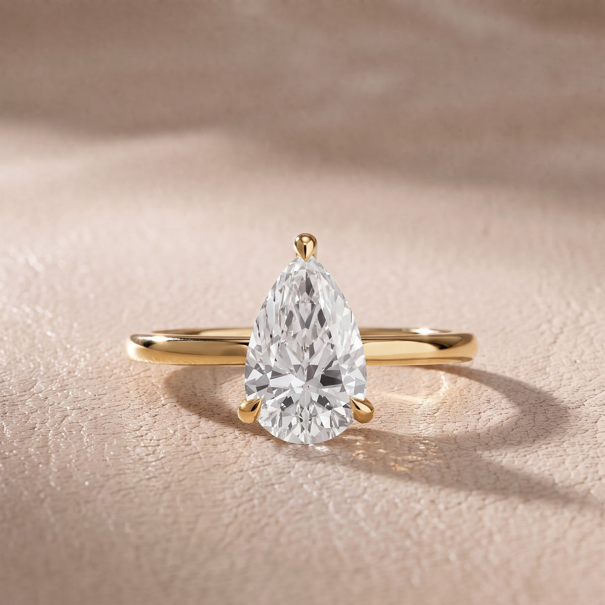 Nella Petite Solitaire Pear Diamond Engagement Ring in Yellow Gold - front.jpg