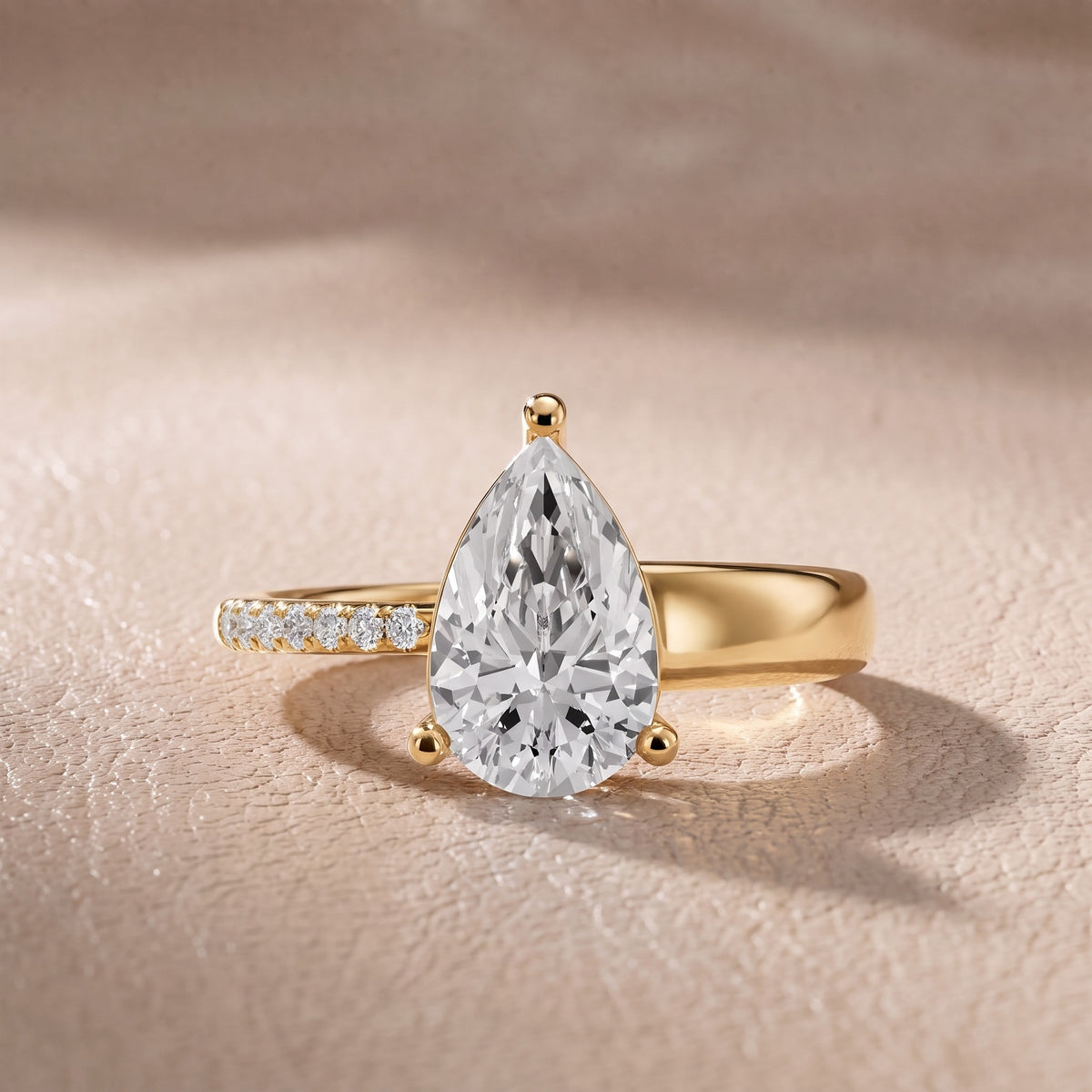 Rosie Solitaire Basket Pear Diamond Engagement Ring in Yellow Gold - front.jpg