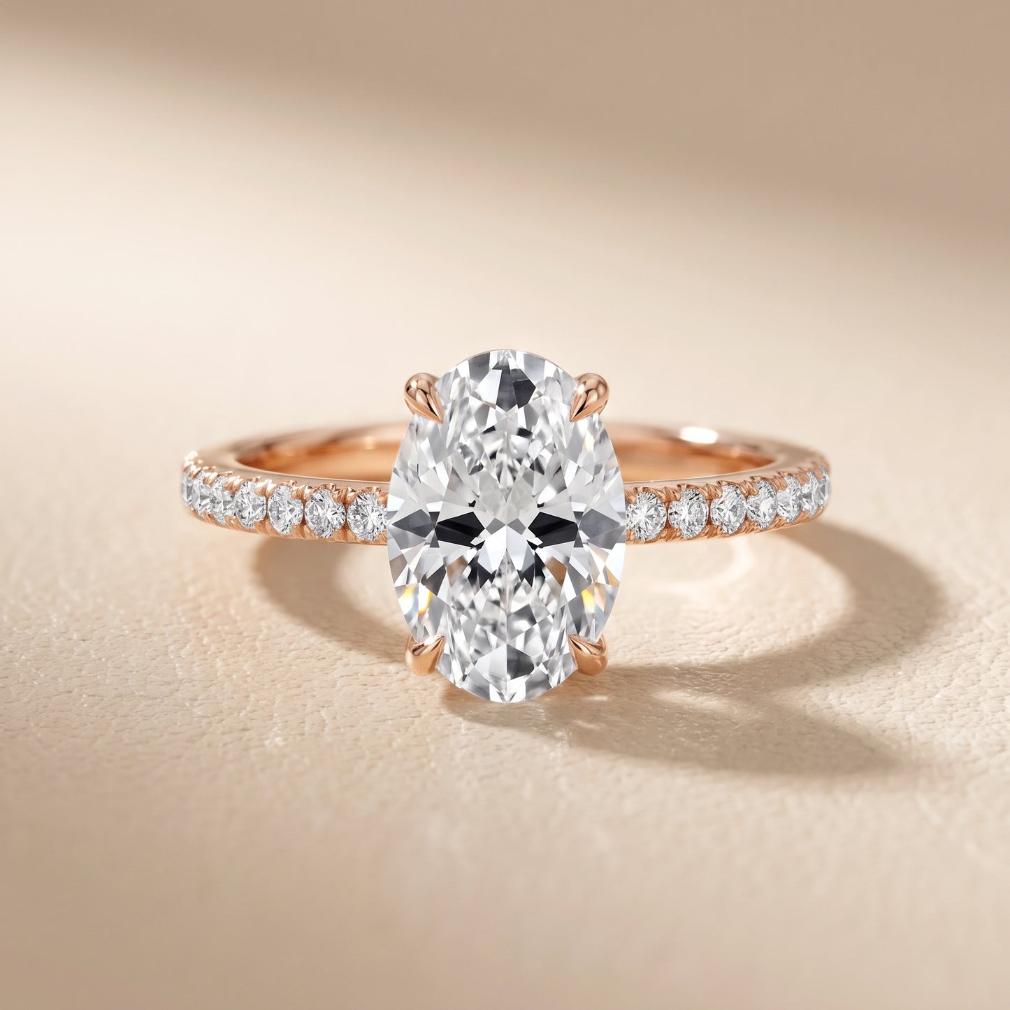 Ione Solitaire Pavé Oval Diamond Engagement Ring in Rose Gold - front.jpg