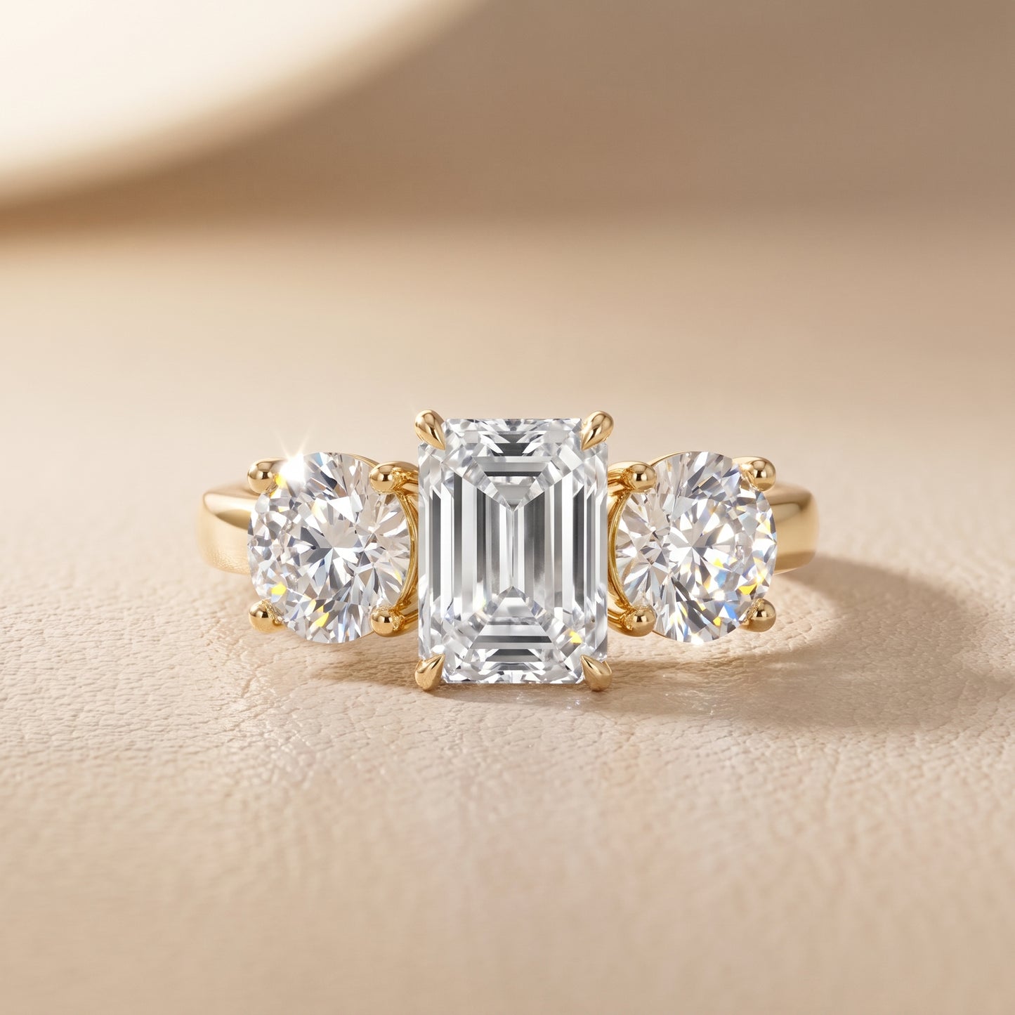Esme Three-Stone Tapered Emerald Diamond Ring in Yellow Gold - front.jpg