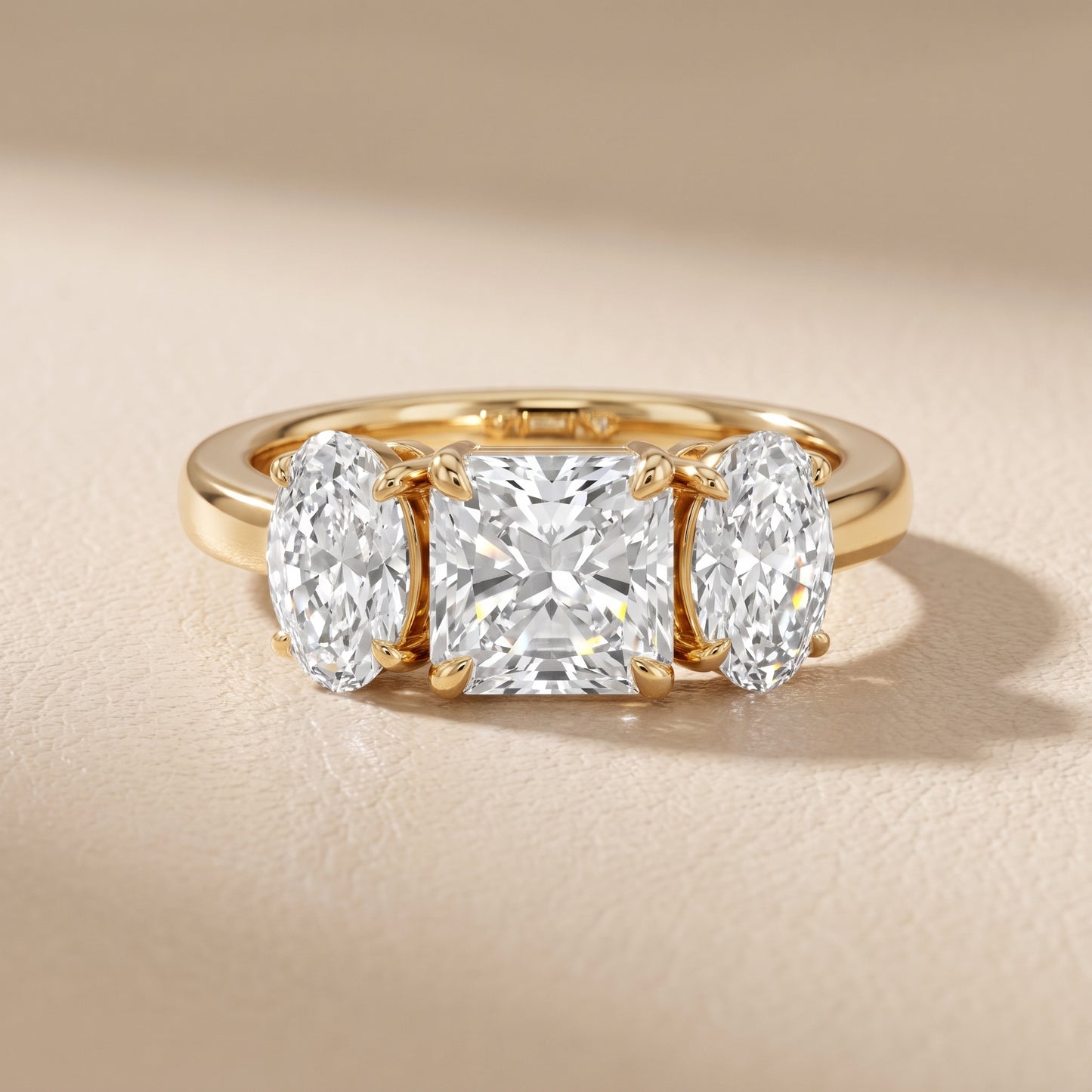 Lila Three-Stone Radiant Diamond Ring in Yellow Gold - front.jpg