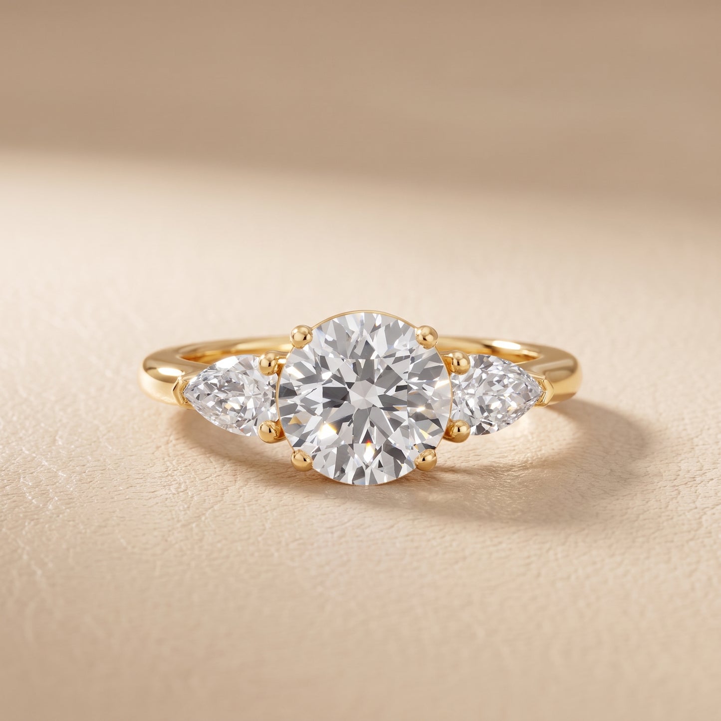 Mirabel Three-Stone Round Diamond Engagement Ring in Yellow Gold - front.jpg