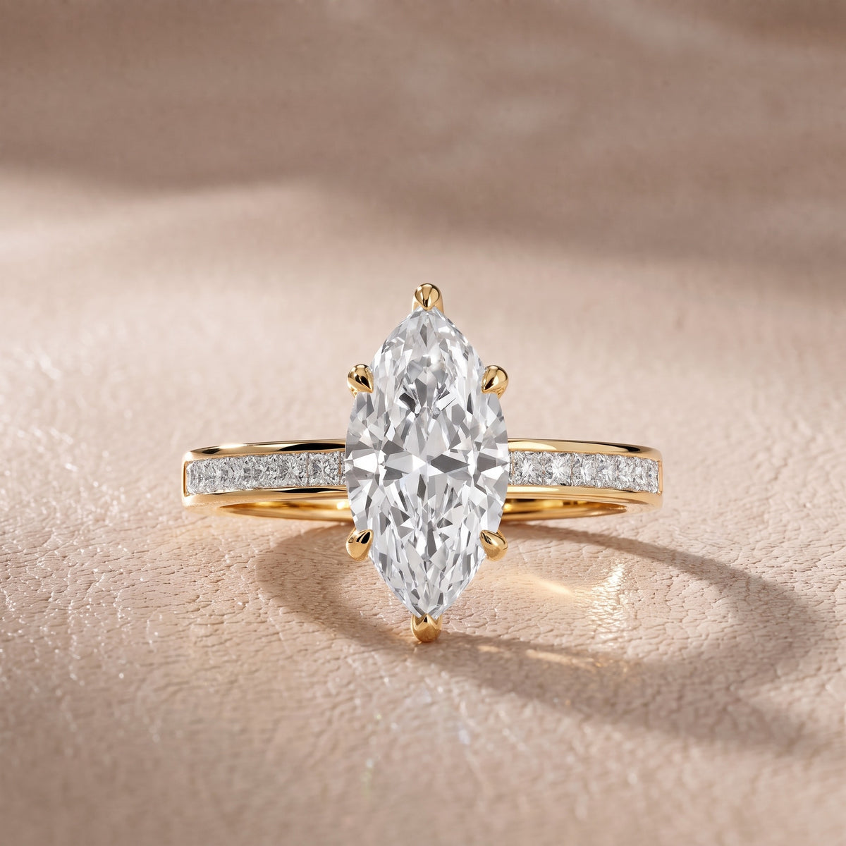 Maren Sidestone Channel Set Marquise Diamond Engagement Ring in Yellow Gold - front.jpg