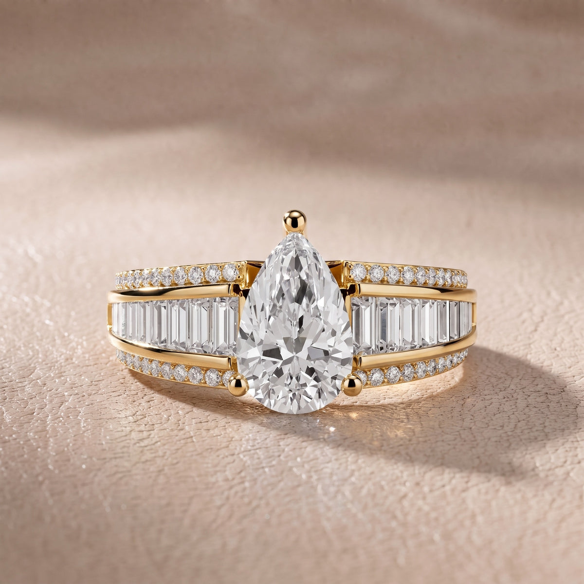 Tara Channel Set Baguette Accent Pear Diamond Engagement Ring in Yellow Gold - front.jpg