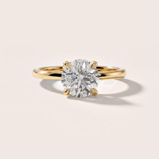 Nella Petite Solitaire Round Diamond Engagement Ring in Yellow Gold