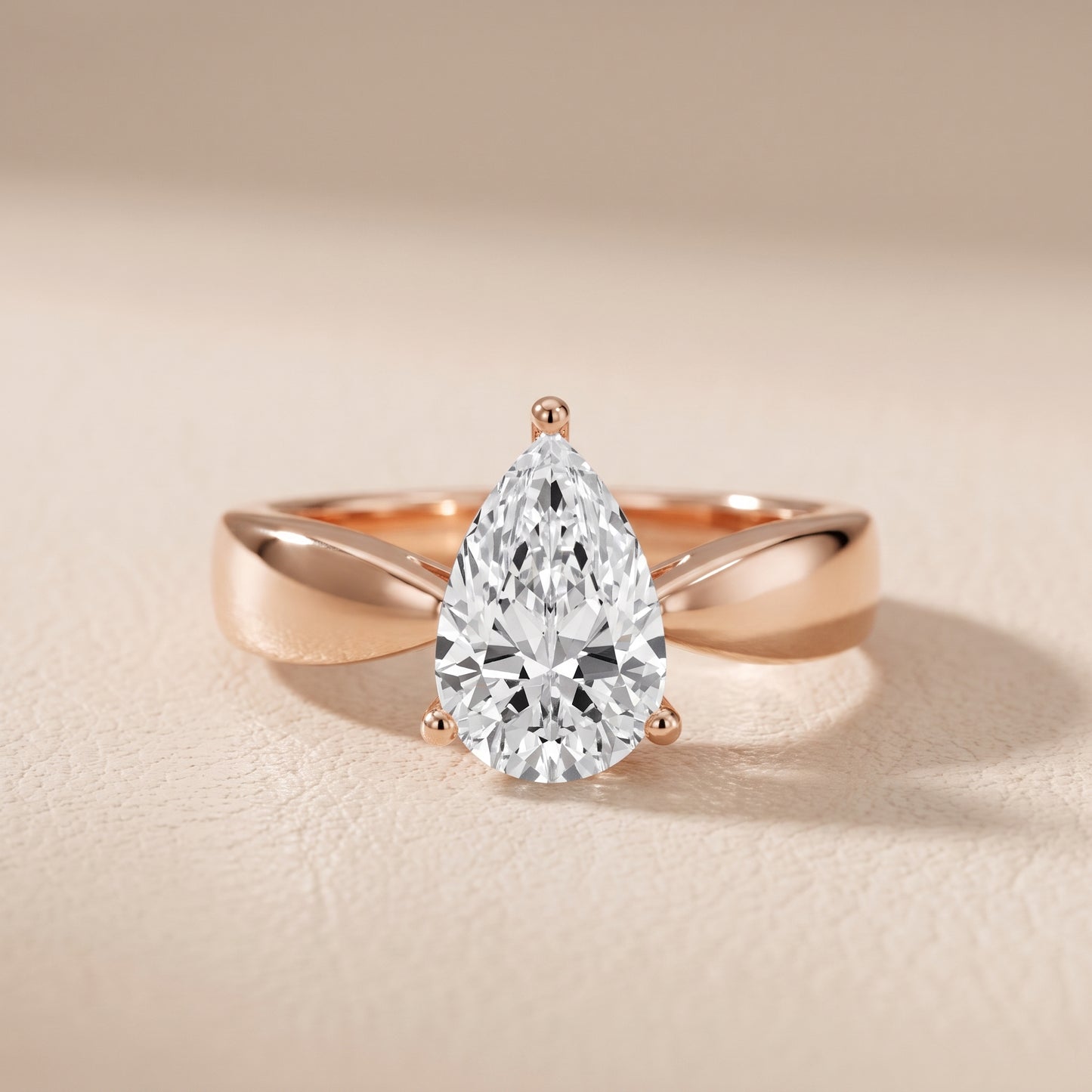 Talia Solitaire Twist Pear Diamond Engagement Ring in Rose Gold - front.jpg