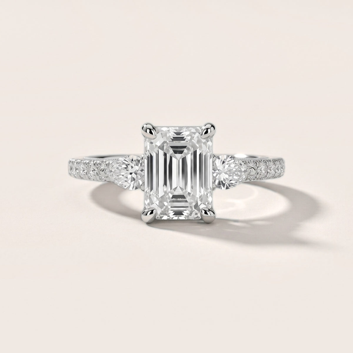 Weston Pear-Side Three-Stone Emerald Diamond Engagement Ring in Silver - front.jpg